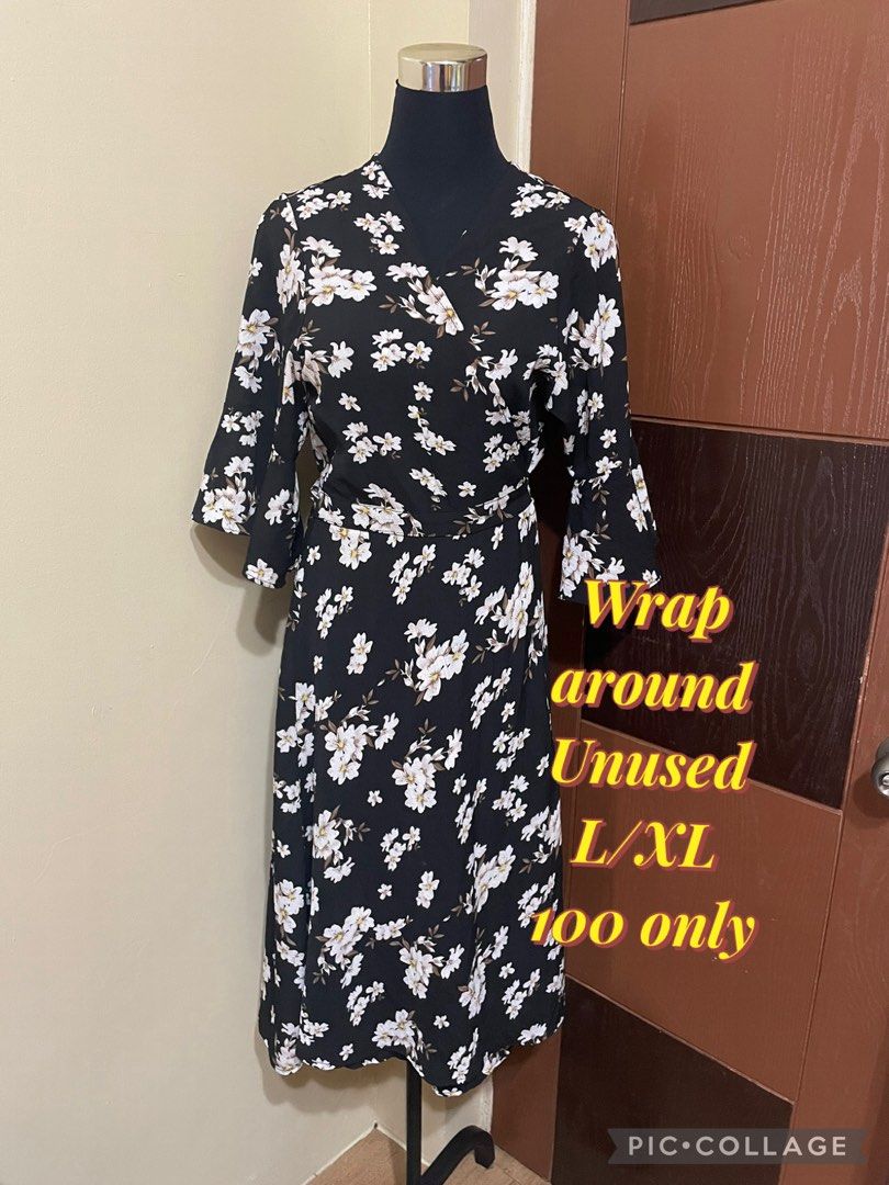 Wrap Around Dress L/XL (Category: Dresses) located in Manila. Submitted by myrthlejun24576 (Listing ID 1436520254, Image 1). Description: Wrap around dress with floral print. Features a V-neckline and 3/4 sleeves. Size L/XL. Unused..