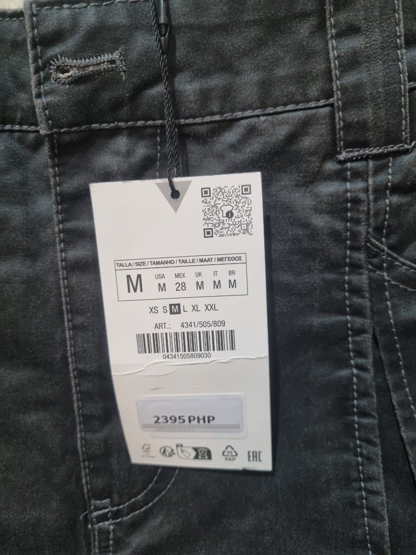 Zara Pleated Skirt - Size M (Category: Skirts) located in Quezon City. Submitted by shopewisely (Listing ID 1436513265, Image 3). Description: - Zara pleated skirt - Dark grey color - Size M - Button closure - With pockets - Made in China.