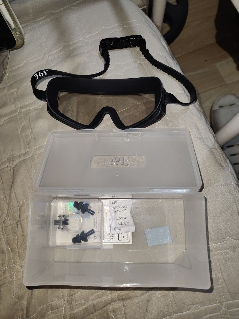 361° Swimming Goggles with Accessories (Category: Water Sports) located in Caloocan City. Submitted by zealwind.6c23d3 (Listing ID 1436765500, Image 2). Description: - 361° Swimming Goggles Set - Includes: - Goggles with clear lenses and black frame - Earplugs - Clear storage case - Adjustable strap for a comfortable fit - Ideal for swimming Never been used sa dagat or sa pool, sinukat lang RFS: not compatible with my face, much better sakin ung 