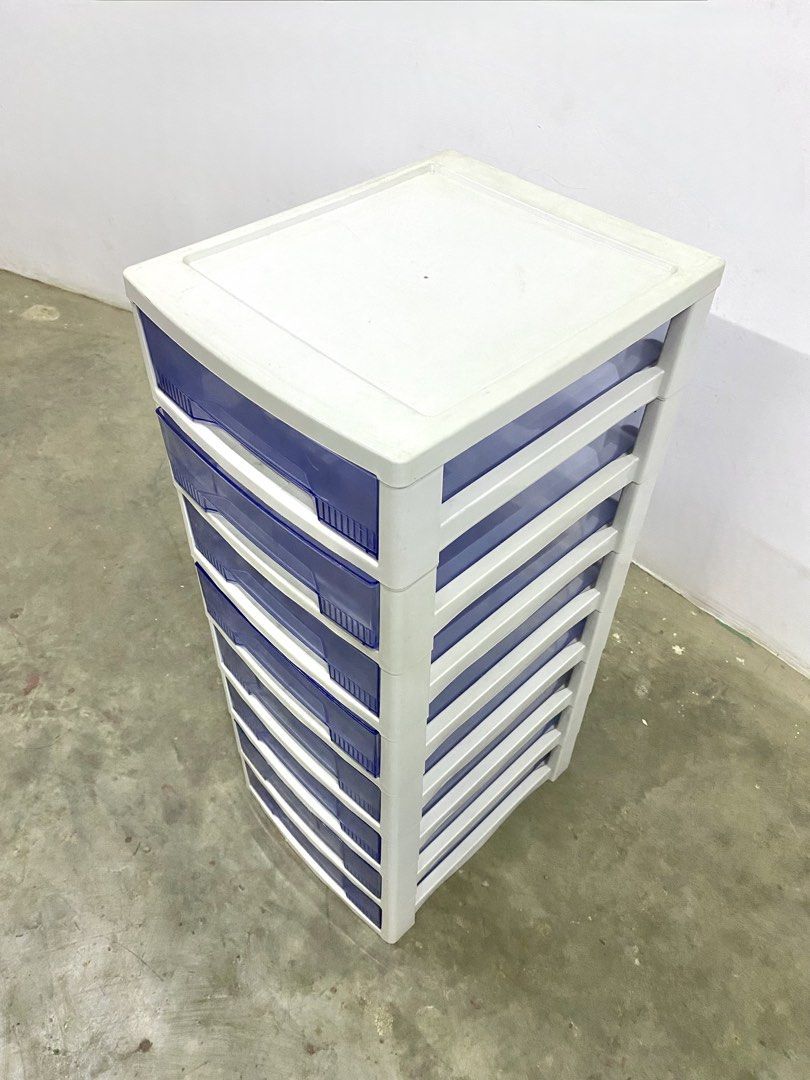 8-Tier Plastic Storage Drawer (Category: Storage Boxes & Baskets) located in Santa Rosa. Submitted by annie_annie83 (Listing ID 1436737048, Image 3). Description: - 8-tier storage drawer - White frame with blue drawers - Clear drawer fronts for easy content visibility - Tall and narrow design saves space - Ideal for small spaces - Perfect for clothes, office supplies, and other items.