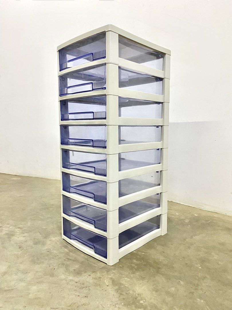 8-Tier Plastic Storage Drawer (Category: Storage Boxes & Baskets) located in Santa Rosa. Submitted by annie_annie83 (Listing ID 1436737048, Image 2). Description: - 8-tier storage drawer - White frame with blue drawers - Clear drawer fronts for easy content visibility - Tall and narrow design saves space - Ideal for small spaces - Perfect for clothes, office supplies, and other items.