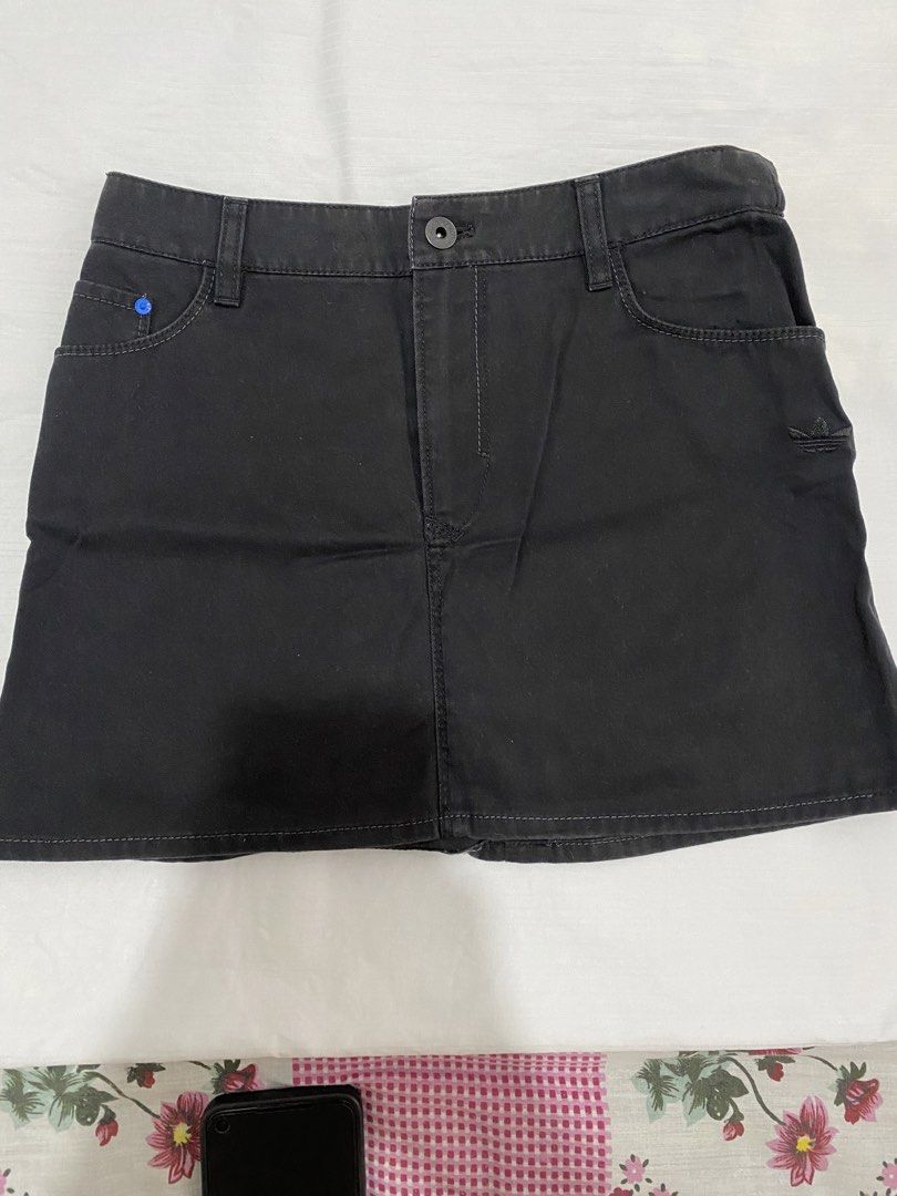 Adidas Black Denim Skirt (Category: Skirts) located in Subic. Submitted by raeux (Listing ID 1436685372, Image 2). Description: ✨ Best fit: Small - Medium ✨ Altered - Adidas black denim skirt - Embroidered Adidas logo - Button and zipper closure - Mini skirt style .