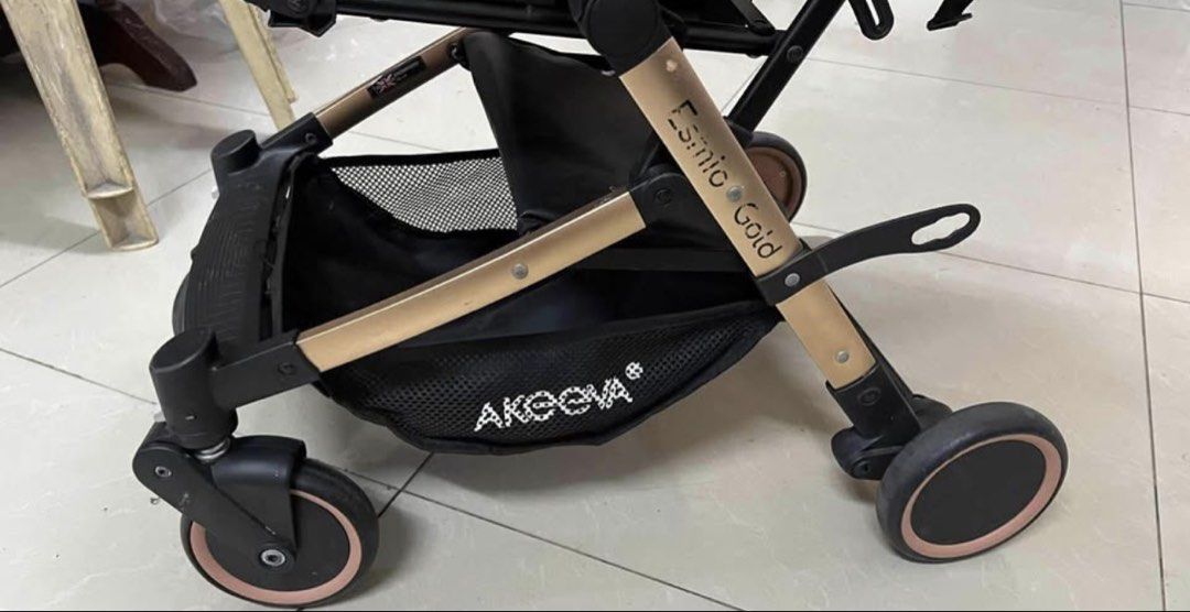 Akeeva Esmio Gold Stroller (Category: Strollers) located in Manila. Submitted by CassyR (Listing ID 1436786174, Image 3). Description: Cabin-Approved, Luggage-Style Stroller ✅ Lightweight & Travel-Friendly ✅ Gold-Plated Frame with Luxe Leather Touches ✅ One-Hand Fold, Self-Standing Design ✅ Comfort Meets Convenience – For Baby & You Lightly Used only RFS: Need to buy smaller type of Stroller 📍Tondo, Manila 💸: Gcash, Bank Transfer 🚚: Lalamove.