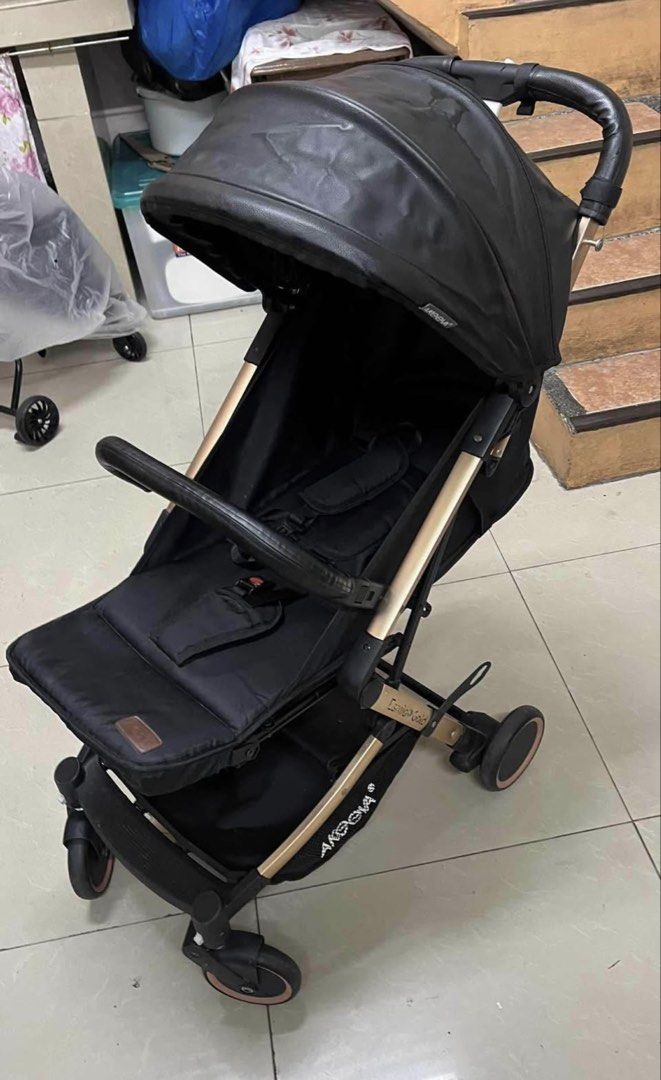 Akeeva Esmio Gold Stroller (Category: Strollers) located in Manila. Submitted by CassyR (Listing ID 1436786174, Image 1). Description: Cabin-Approved, Luggage-Style Stroller ✅ Lightweight & Travel-Friendly ✅ Gold-Plated Frame with Luxe Leather Touches ✅ One-Hand Fold, Self-Standing Design ✅ Comfort Meets Convenience – For Baby & You Lightly Used only RFS: Need to buy smaller type of Stroller 📍Tondo, Manila 💸: Gcash, Bank Transfer 🚚: Lalamove.