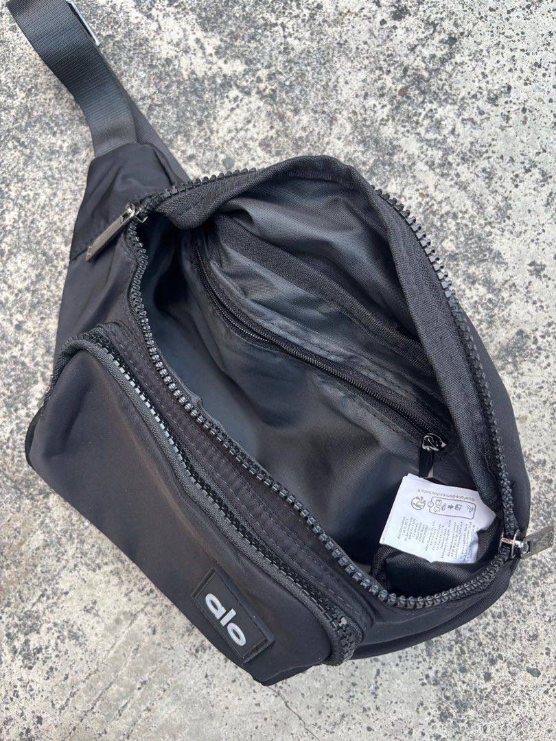 Alo Yoga Black Sling Bag (Category: Cross-body Bags) located in Quezon City. Submitted by nojthrift (Listing ID 1436760682, Image 2). Description: Alo yoga belt bag No issue As new condi 850+ship only.