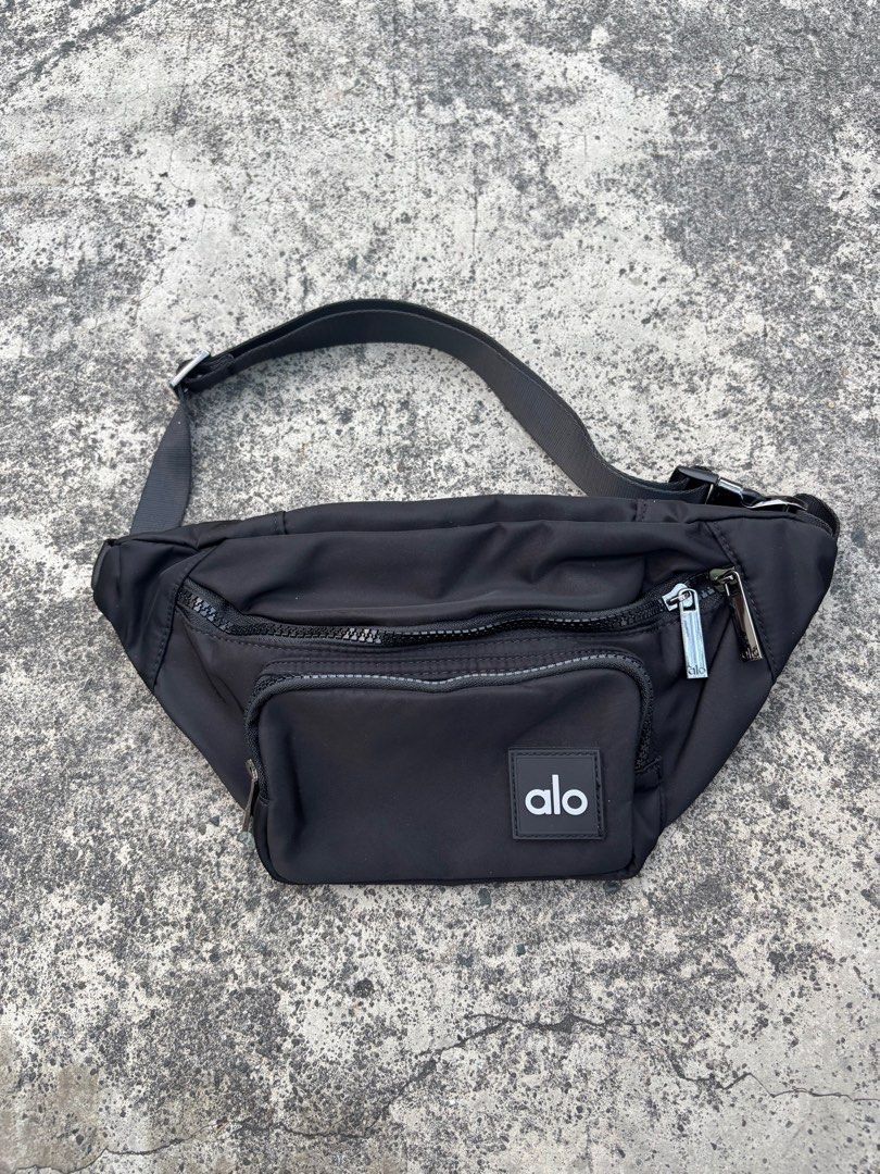 Alo Yoga Black Sling Bag (Category: Cross-body Bags) located in Quezon City. Submitted by nojthrift (Listing ID 1436760682, Image 1). Description: Alo yoga belt bag No issue As new condi 850+ship only.
