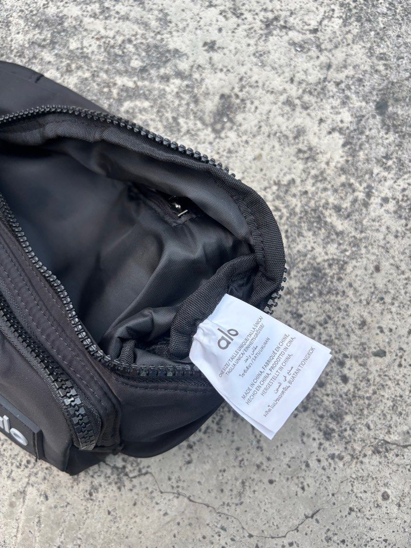 Alo Yoga Black Sling Bag (Category: Cross-body Bags) located in Quezon City. Submitted by nojthrift (Listing ID 1436760682, Image 3). Description: Alo yoga belt bag No issue As new condi 850+ship only.