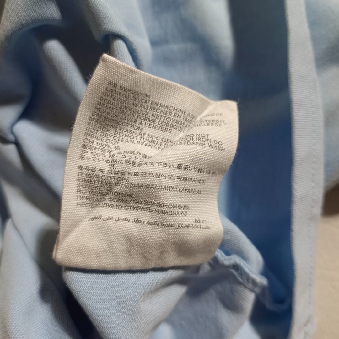 AMI LIGHT BLUE SHIRT (Category: Activewear) located in Baguio. Submitted by freshmarket_2600 (Listing ID 1436671736, Image 3). Description: Brand: Ami Tags: washtag and shoulder size tag only Size: M on tag Dimension: L28W21.5 Condition: Excellent Color rate: 10/10 Color: Blue Issue/s: None.