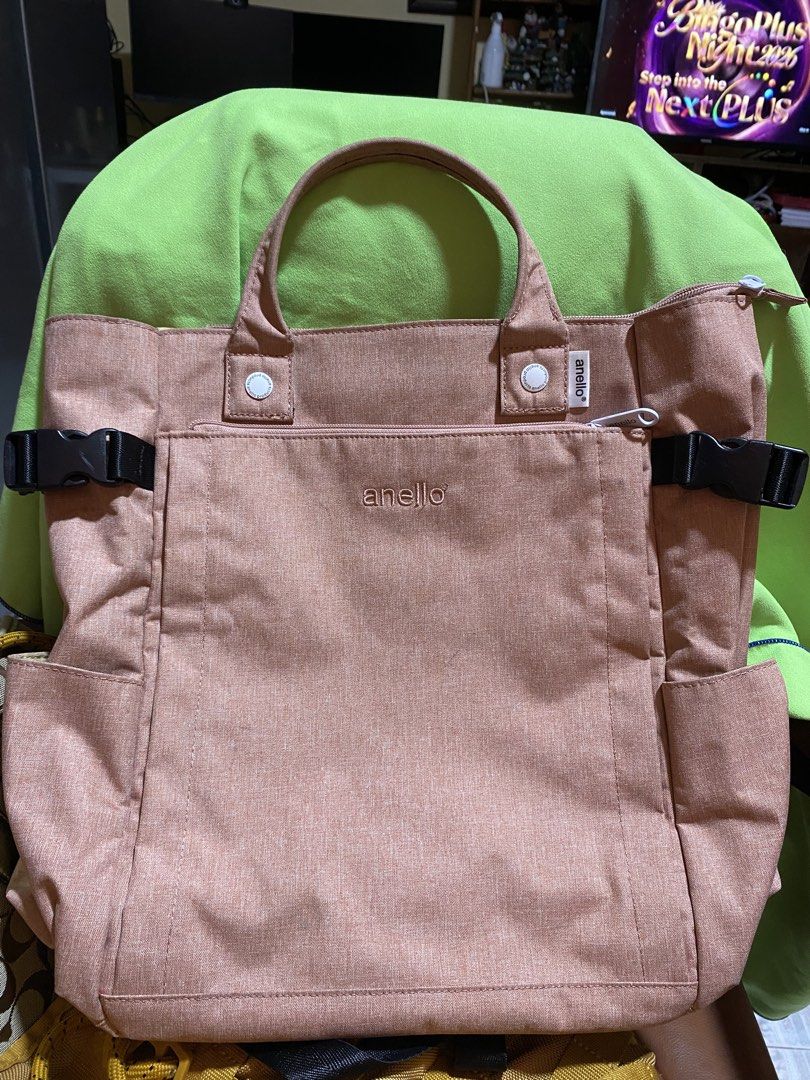Anello Backpack (Category: Tote Bags) located in Manila. Submitted by sophysells (Listing ID 1436755717, Image 1). Description: - Anello tote bag - Muted pink color - Spacious interior with multiple compartments - Adjustable straps - Side pockets - Front pocket with buckles Meet-up: SM Baguio Delivery: J&T or LBC (Buyer will shoulder the delivery fee; price of the delivery is not yet included in the price).