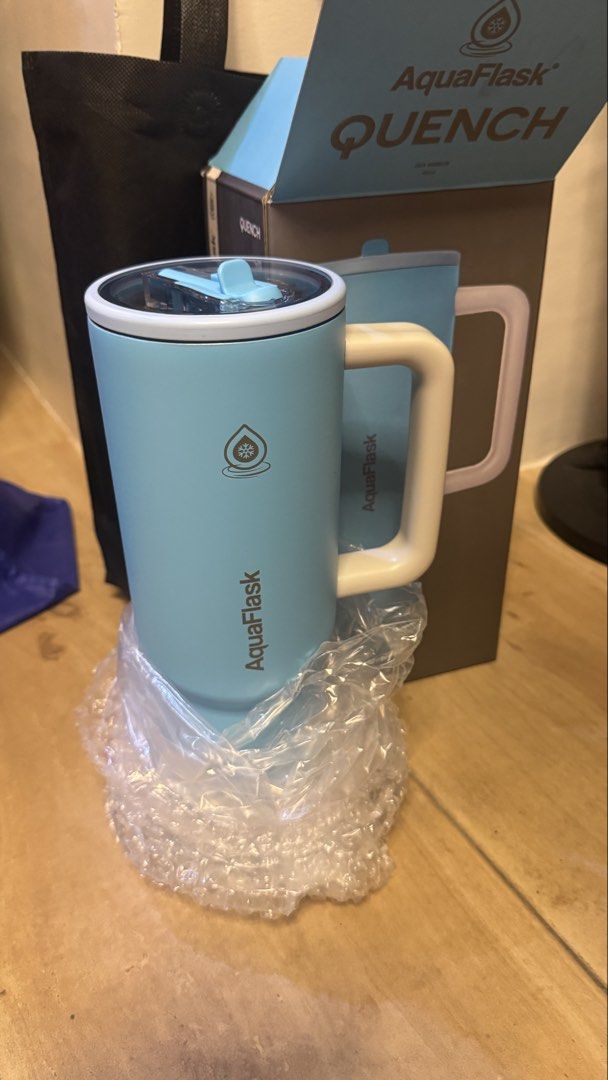 AquaFlask Quench Tumbler 40oz (Category: Water Bottles & Tumblers) located in Manila. Submitted by btfmendoza (Listing ID 1436768547, Image 1). Description: - AquaFlask Quench tumbler - Light blue color (Sea Breeze) -40oz - Includes handle and straw lid - Brand new, in original packaging -no scratches, no dents - Comes with box and bubble wrap .