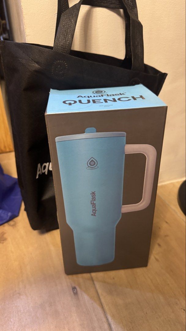 AquaFlask Quench Tumbler 40oz (Category: Water Bottles & Tumblers) located in Manila. Submitted by btfmendoza (Listing ID 1436768547, Image 2). Description: - AquaFlask Quench tumbler - Light blue color (Sea Breeze) -40oz - Includes handle and straw lid - Brand new, in original packaging -no scratches, no dents - Comes with box and bubble wrap .