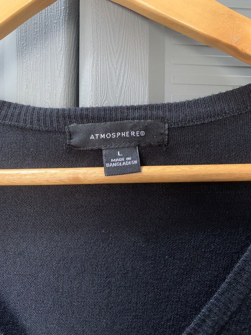 Atmosphere Black Knitted Cardigan - Size L (Category: Coats, Jackets and Outerwear) located in Bacoor. Submitted by krisery (Listing ID 1436694465, Image 2). Description: - Brand: Atmosphere - Black Knitted Cardigan - Size: L - Fabric: Soft Thin Knitted (Stretchable) - Features a V-neck - Complete Buttons - Button-down closure - Ribbed cuffs - Made in Bangladesh - Color Rate: 10/10.
