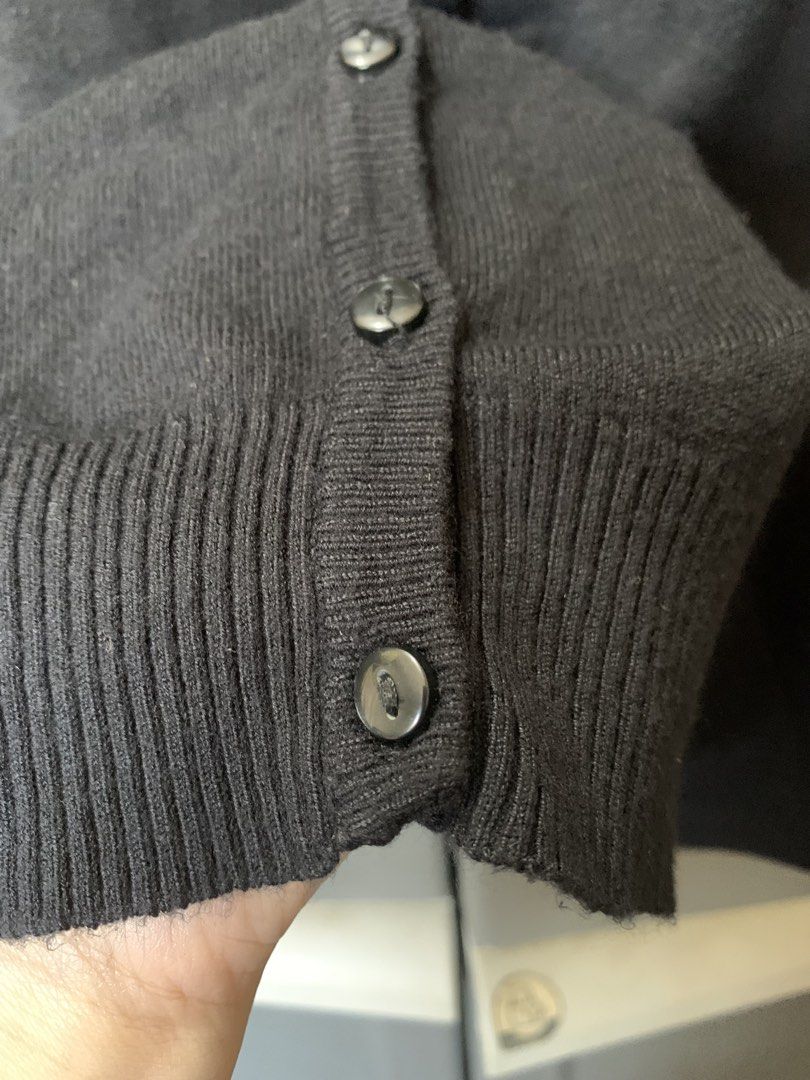 Atmosphere Black Knitted Cardigan - Size L (Category: Coats, Jackets and Outerwear) located in Bacoor. Submitted by krisery (Listing ID 1436694465, Image 3). Description: - Brand: Atmosphere - Black Knitted Cardigan - Size: L - Fabric: Soft Thin Knitted (Stretchable) - Features a V-neck - Complete Buttons - Button-down closure - Ribbed cuffs - Made in Bangladesh - Color Rate: 10/10.