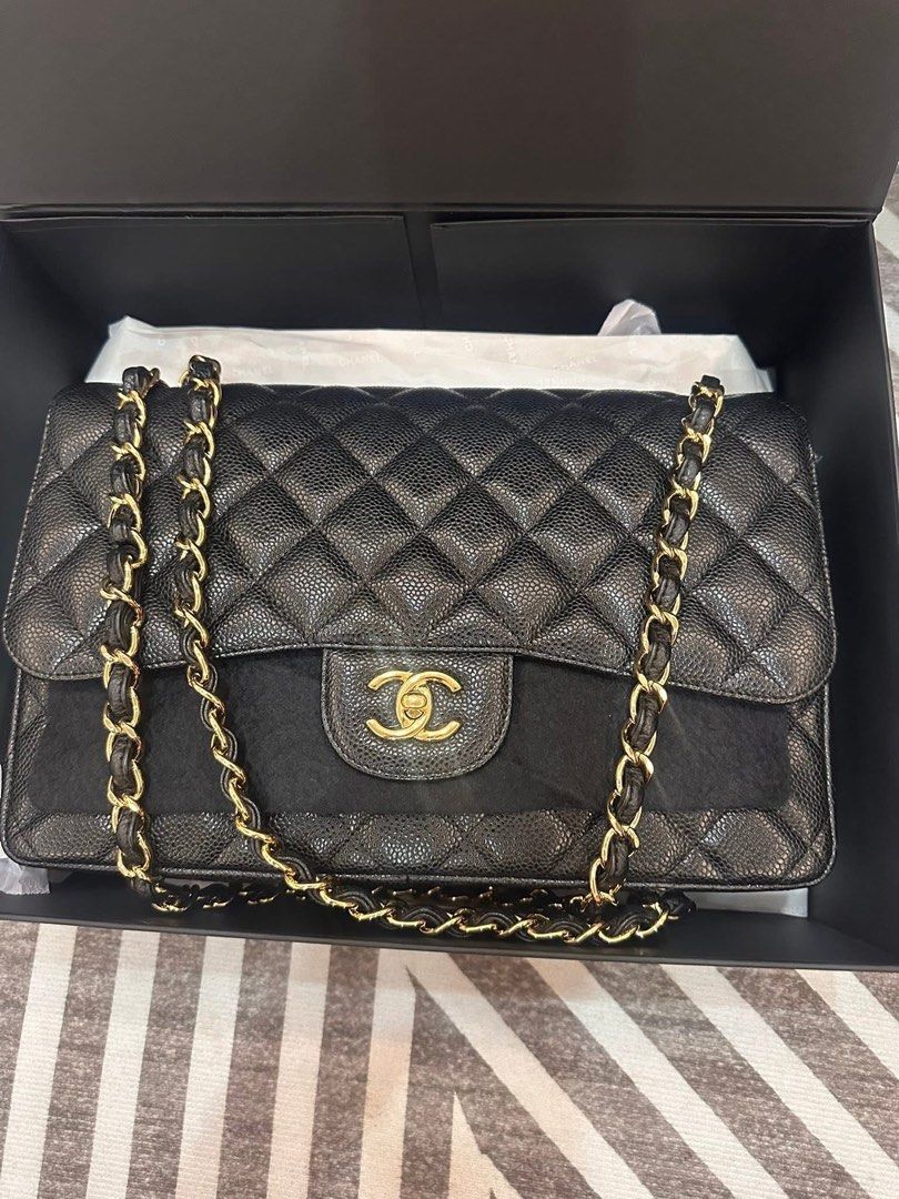 Authentic Chanel Caviar GHW Jumbo Double Flap (Category: Luxury Bags & Wallets) located in Quezon City. Submitted by jhaediah (Listing ID 1382177259, Image 1). Description: Authentic 💯Jumbo caviar gold Rank A ♥️5.8 With box and dustbag Free Pabitbit Korea - fully paid before paship Pinas.