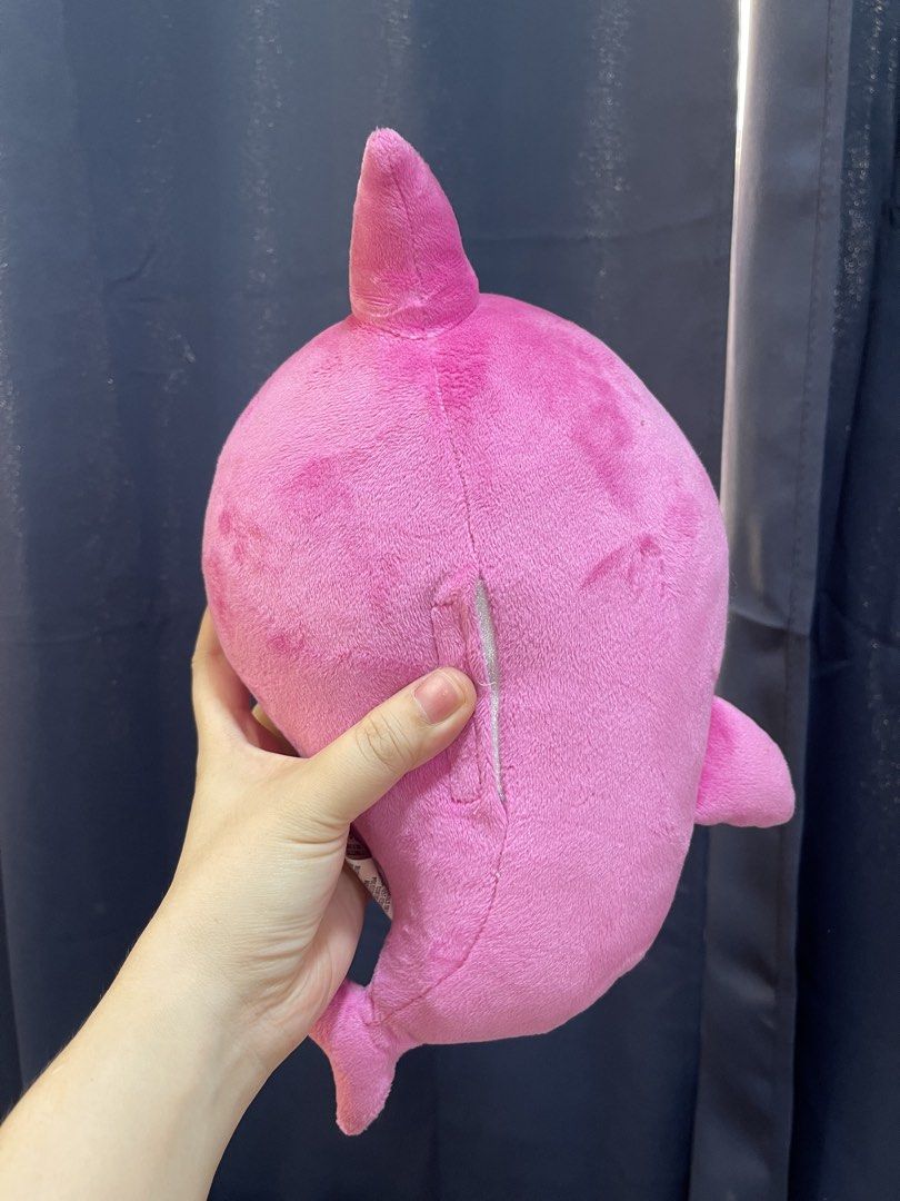 Baby Shark Plush Toy (Category: Plushies & Soft Toys) located in Taguig. Submitted by supplementary (Listing ID 1436654004, Image 2). Description: - Adorable Baby Shark plush toy. - Features a cute pink body and white belly. - Smiling face and a fin on its back. - Soft and huggable material. - Ideal for kids of all ages..
