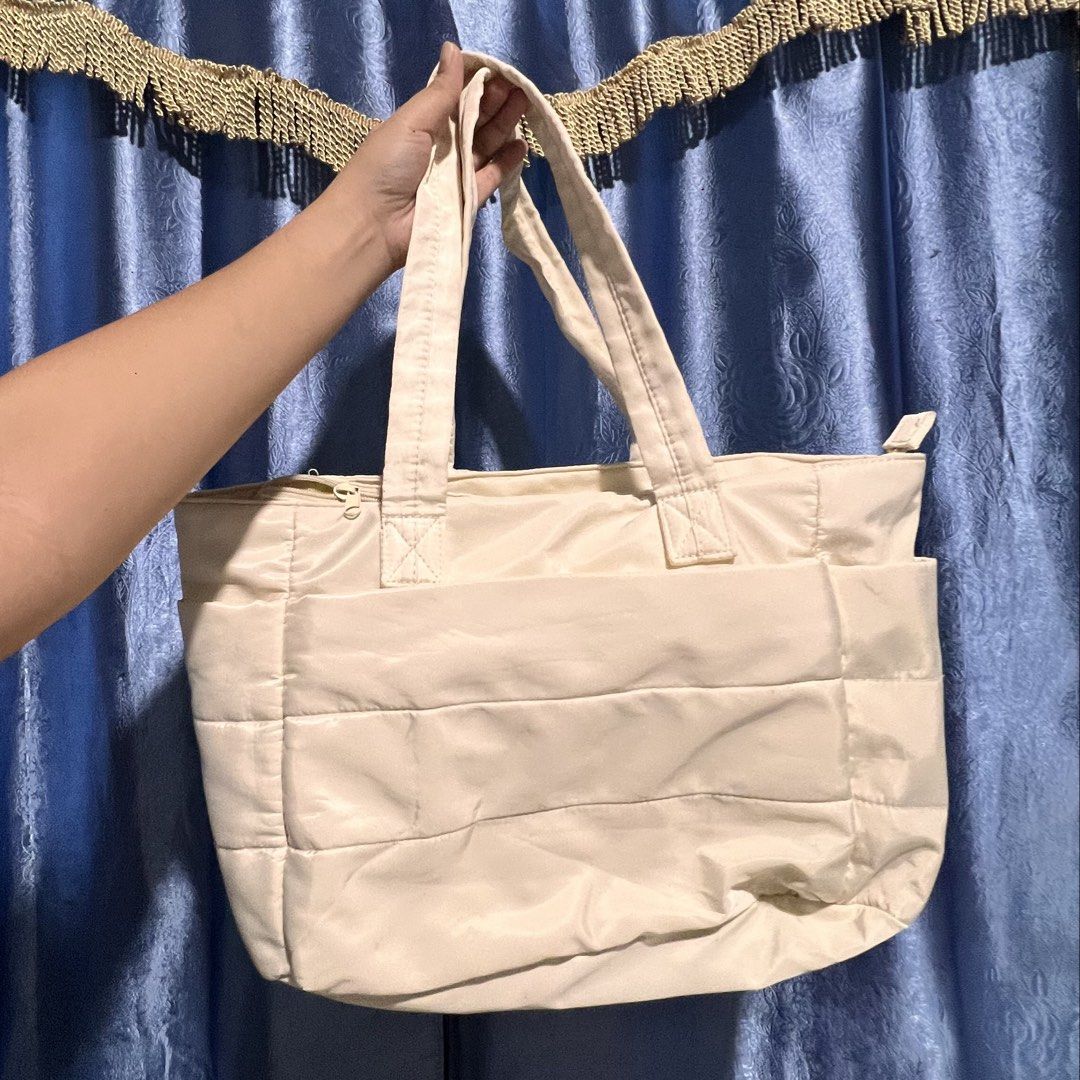 beige cream puffy tote bag (Category: Tote Bags) located in Valenzuela. Submitted by ally.declutter (Listing ID 1436783554, Image 3). Description: very convenient and chic for students :) dimensions posted w the photos last price .