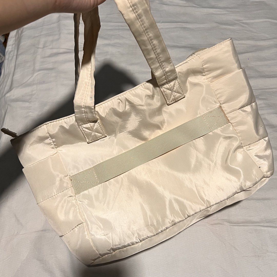 beige cream puffy tote bag (Category: Tote Bags) located in Valenzuela. Submitted by ally.declutter (Listing ID 1436783554, Image 2). Description: very convenient and chic for students :) dimensions posted w the photos last price .