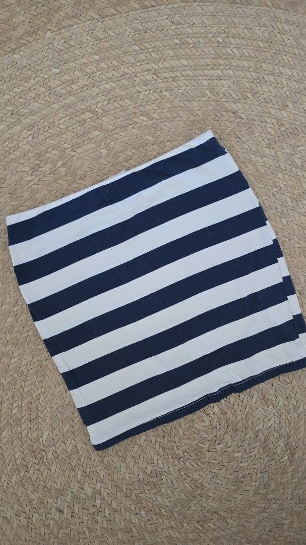 Bershka mini pencil skirt (Category: Skirts) located in Paranaque City. Submitted by caaands (Listing ID 1436740564, Image 1). Description: - Navy blue and white striped - Garter waist - Stretchy fabric.