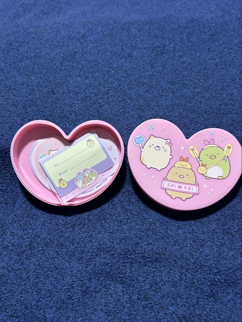 Bo33 Sumikko Gurashi heart-shaped memo case (Category: Designer & Blind Box Toys) located in Angeles City. Submitted by zyeplustradings (Listing ID 1436757006, Image 2). Description: Sumikko Gurashi heart-shaped memo case Design: The pink, heart-shaped plastic cases feature popular Sumikko Gurashi characters and are intended for storing small items or note cards. approximately 5.1 x 4.3 x 2.0 inches.