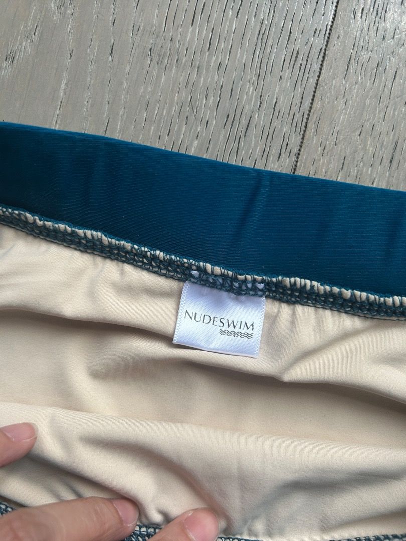 Nudeswim High Waist Bikini Bottom (Category: Bikinis & Swimsuits) located in Makati City. Submitted by at.preloved (Listing ID 1436717447, Image 3). Description: - Black bikini top from Body Swimwear - Teal high-waisted bottoms from Nudeswim (Size M) - Bottoms feature a folded waistband and beige lining.
