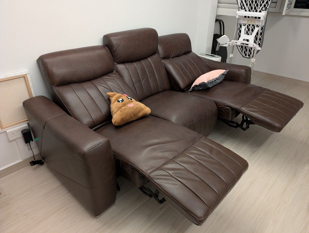 Brown Leather Reclining Sofa (Category: Sofas) located in Singapore. Submitted by ecth11 (Listing ID 1436770418, Image 2). Description: I bought this sofa 4 years ago for my bedroom (not living room). however to be honest, this sofa is very underutilized. Most of the time me and my wife we just hangout in our living room which we used as our study. So this sofa end up use for putting our clothes after washing. I bought it at a furniture shop alon