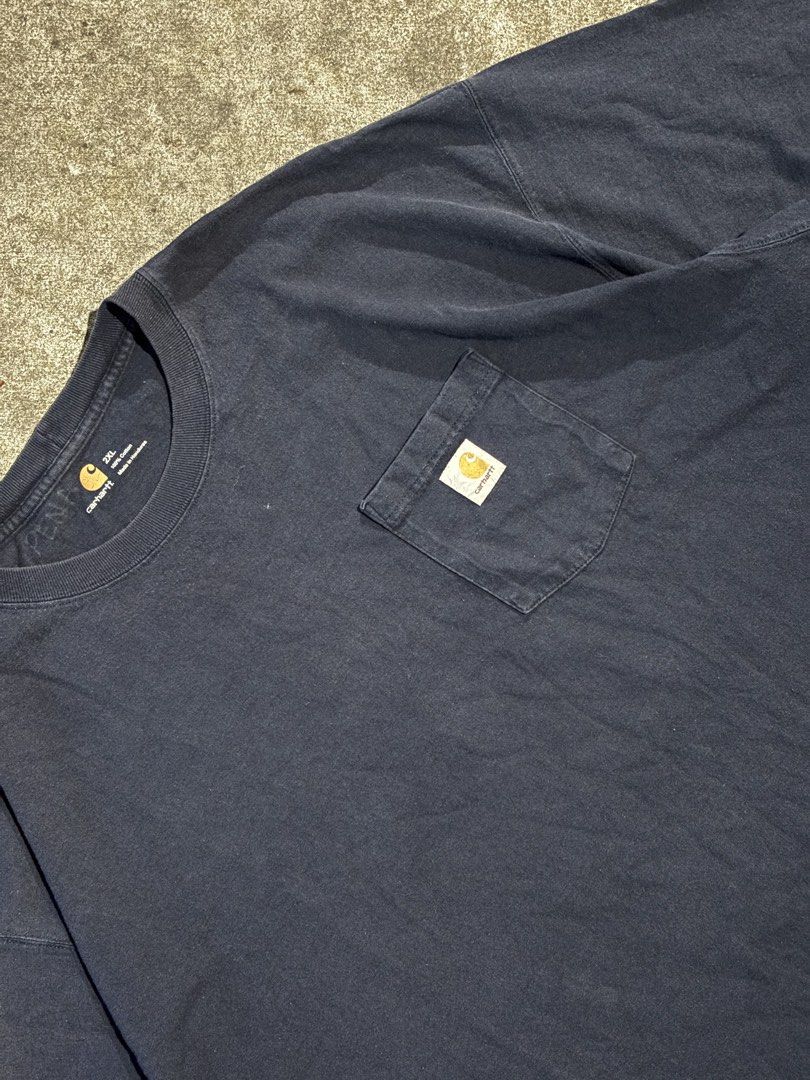 Carhartt Pocket Tee - Navy Blue - 2XL (Category: Tshirts & Polo Shirts ) located in Batangas. Submitted by aimhrandel40321 (Listing ID 1436762503, Image 2). Description: CARHARTT K87 POCKET TEE Issue : none (need wash) Condition : Excellent (need wash) Size on tag : XL Color rate : 8.8/10 Width × Length : 29 x 31 Mine: 700 + Shipping fee.