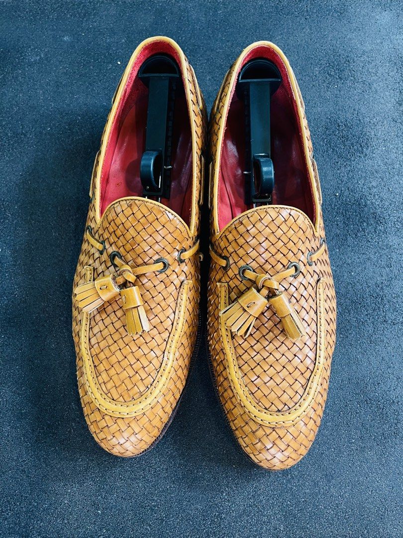 Carmina Woven Leather Loafers (Category: Dress Shoes) located in Makati City. Submitted by chuckap (Listing ID 1436658485, Image 1). Description: ORIG PRICE 75,000!! Only 16,500 Size: 9UK/ 10US Men Color: Tan Condition: well used Sole: good year welted - Carmina woven leather loafers - Light brown color - Tassel detail - Classic loafer silhouette - Leather sole - Red leather lining - Signs of wear on soles.