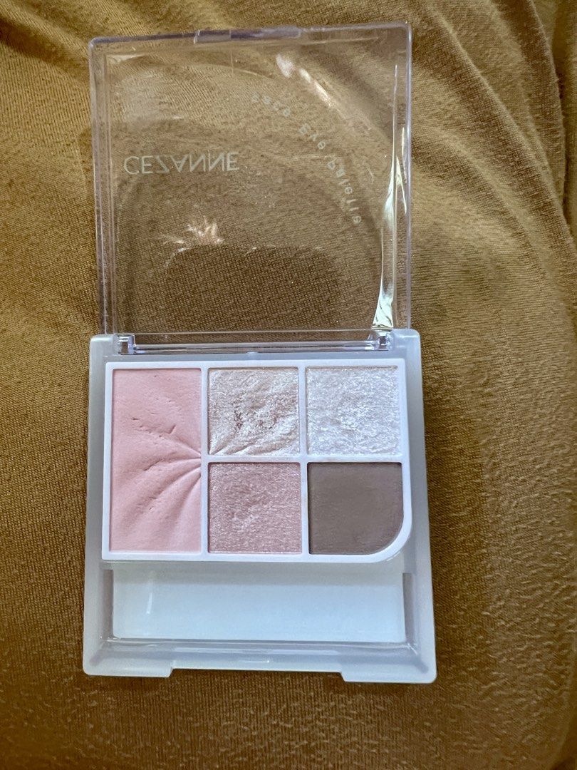 Cezanne Face Eye Palette 01 coral (Category: Makeup) located in Makati City. Submitted by coollections (Listing ID 1436823336, Image 2). Description: - Cezanne Face Eye Palette in shade 01 - Includes blush and eyeshadow shades - Features a mix of matte and shimmer finishes - Product details and instructions on the back SWATCHED ONCE ONLY.
