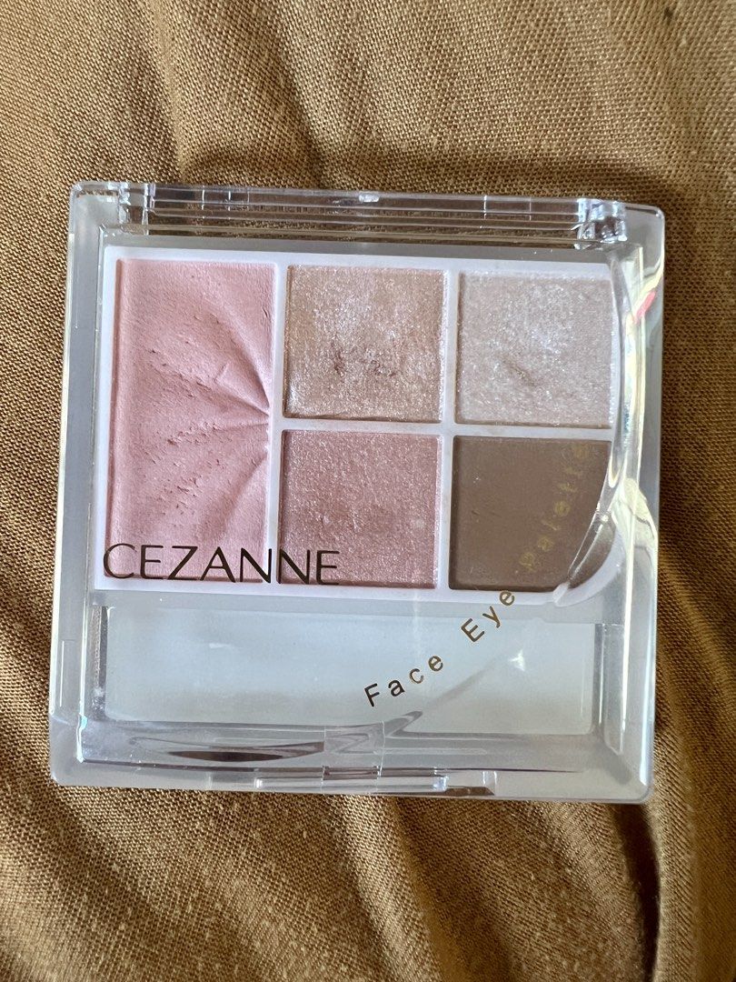 Cezanne Face Eye Palette 01 coral (Category: Makeup) located in Makati City. Submitted by coollections (Listing ID 1436823336, Image 1). Description: - Cezanne Face Eye Palette in shade 01 - Includes blush and eyeshadow shades - Features a mix of matte and shimmer finishes - Product details and instructions on the back SWATCHED ONCE ONLY.
