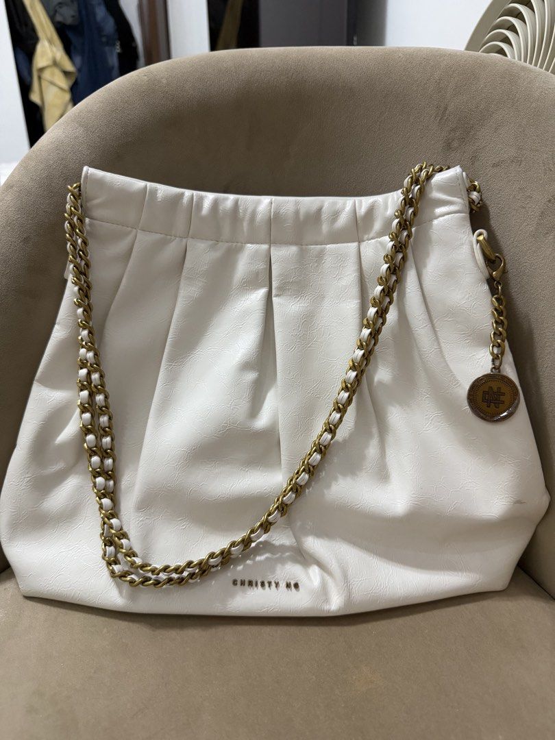 Christy Ng White Chain Bag (Category: Luxury Bags & Wallets) located in Mandaluyong City. Submitted by minebynhez (Listing ID 1436799144, Image 1). Description: Preloved Christy Ng Chain Bag .