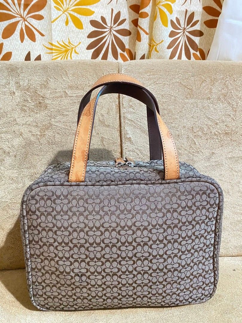 Coach (Category: Luxury Bags & Wallets) located in Dumaguete. Submitted by camillaolshoppe2 (Listing ID 1436737159, Image 3). Description: Coach Signature C BRWN Jacquard Canvas Leather Handle Travel Cosmetic Makeup Bag minimal watermarks lang sa leather super pretty.