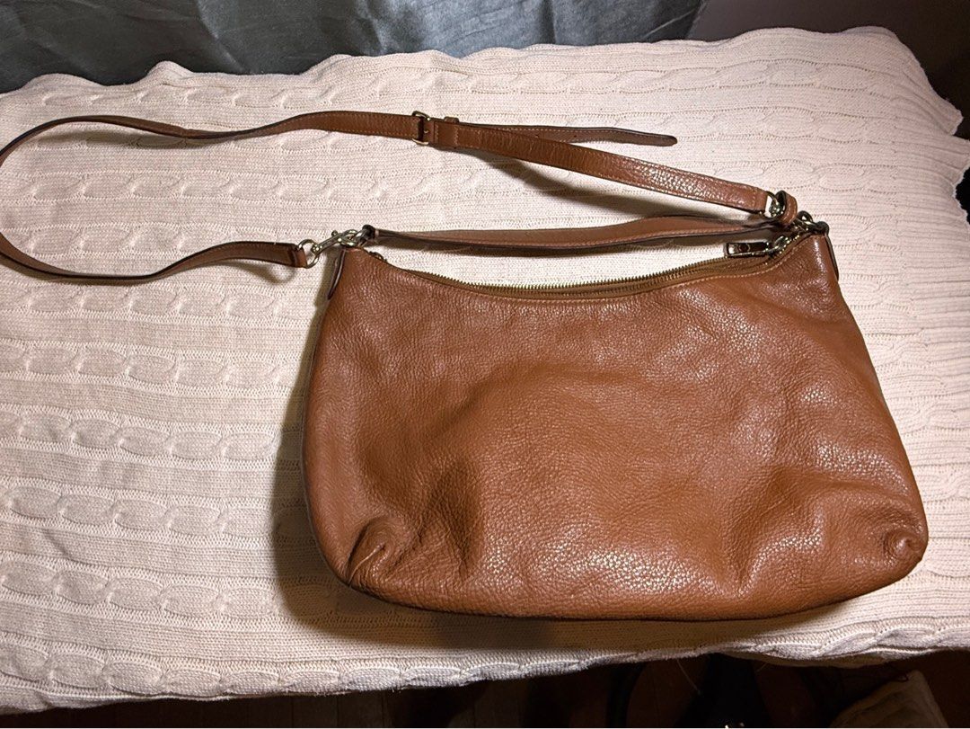 Coach East & West Celeste Convertible Hobo Bag (Category: Luxury Bags & Wallets) located in Antipolo. Submitted by by.stef (Listing ID 1436765895, Image 2). Description: Authentic Coach leather shoulder/crossbody bag Soft tan/caramel leather With original Coach dust bag included 😊 Used for personal use but still in very good usable condition overall. Interior is clean and zipper works smoothly. Please manage expectations for a preloved item with
