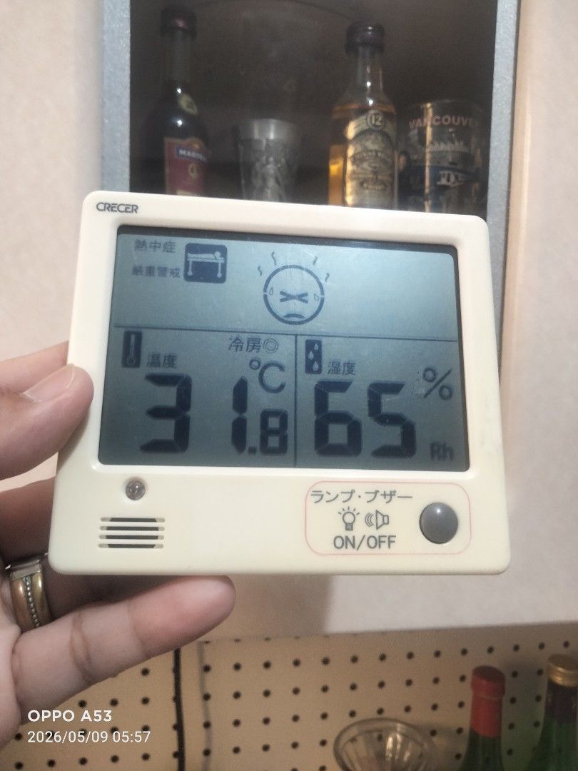 Crecer Digital Thermometer (Category: Health Monitors & Weighing Scales) located in Carmona. Submitted by rpute (Listing ID 1423775196, Image 1). Description: Crecer digital thermometer displays temperature in Celsius and relative humidity. It features an on/off button for the lamp/buzzer function. The screen shows a temperature of 29.5°C and a humidity level of 64%..