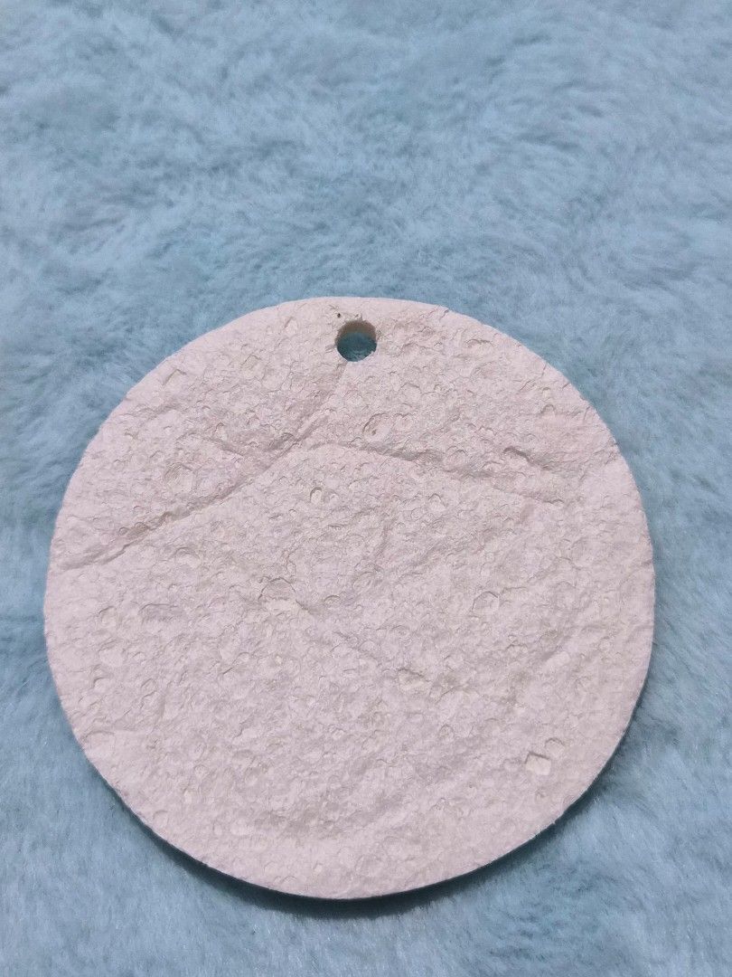 Cute Cat Coaster (Category: Other Kitchenware & Tableware) located in Mandaue City. Submitted by chuchi152615 (Listing ID 1436725670, Image 2). Description: - Adorable cat coaster - Round shape - Textured surface - Features a colorful cat illustration (orange, black, white) - Made of a natural, absorbent material - Includes a small hole.
