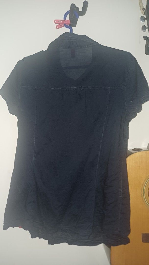 Dark Academia Navy Blue collared short sleeve top (Category: Blouses) located in Manila. Submitted by shieldsapphic_ (Listing ID 1436733811, Image 2). Description: 🌀EDC dark blue long sleeve shirt 🌀Size on tag: L 🌀Features a button-up collar 🌀Classic design 🌀Comfortable fabric 🌀rfs: tight around the arms.