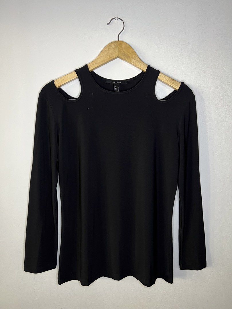 Details Black Shoulder Cutout Top (Category: Others Tops) located in Quezon City. Submitted by pcera (Listing ID 1436786218, Image 1). Description: - Details black top - Size: L - Features: Shoulder cutouts - Style: Long-sleeved, round neckline - Fabric: Smooth, stretchy - Design: Classic and versatile.