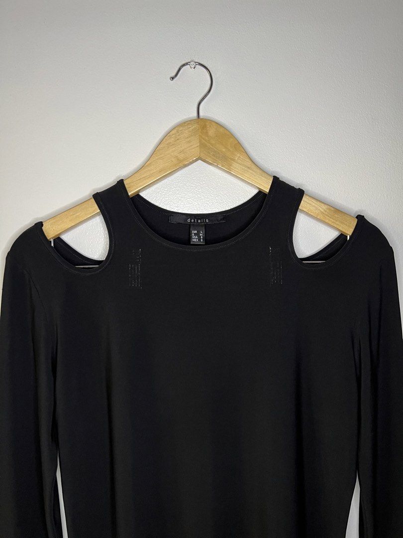 Details Black Shoulder Cutout Top (Category: Others Tops) located in Quezon City. Submitted by pcera (Listing ID 1436786218, Image 2). Description: - Details black top - Size: L - Features: Shoulder cutouts - Style: Long-sleeved, round neckline - Fabric: Smooth, stretchy - Design: Classic and versatile.