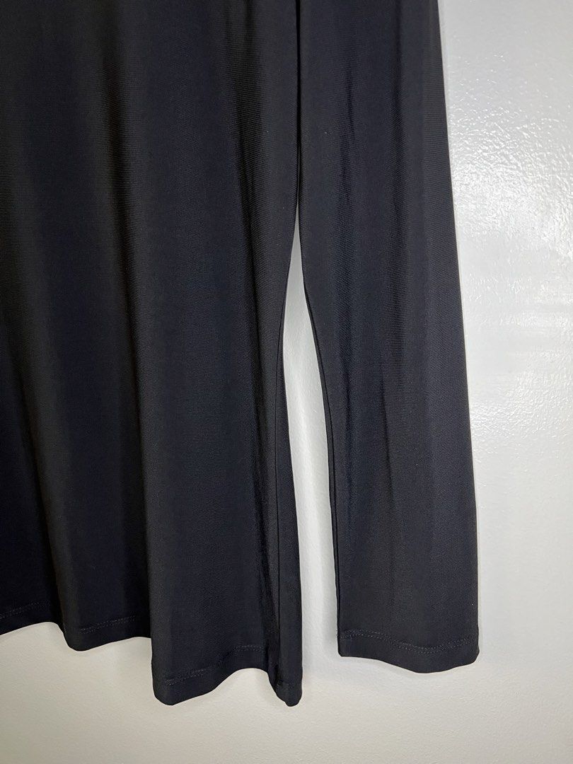 Details Black Shoulder Cutout Top (Category: Others Tops) located in Quezon City. Submitted by pcera (Listing ID 1436786218, Image 3). Description: - Details black top - Size: L - Features: Shoulder cutouts - Style: Long-sleeved, round neckline - Fabric: Smooth, stretchy - Design: Classic and versatile.