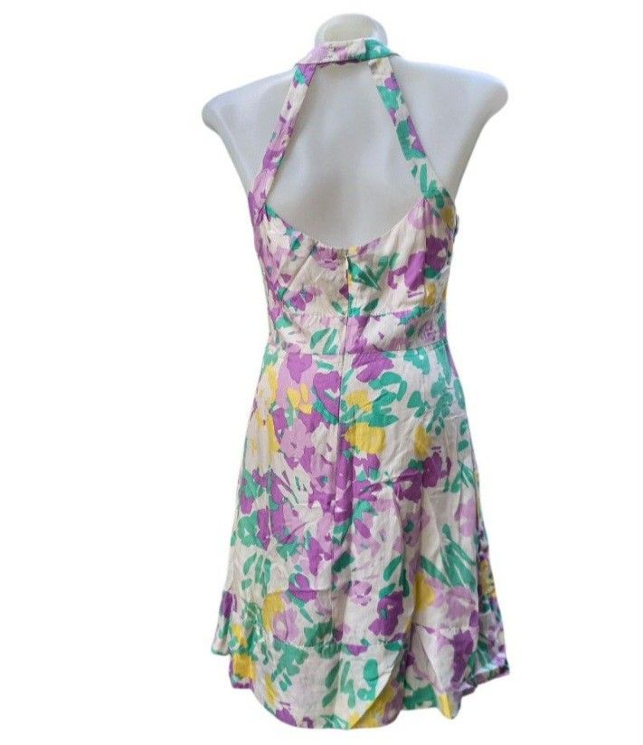 Diane von Furstenberg Silk Halter Dress (Category: Dresses) located in Lamut. Submitted by sakosack (Listing ID 1436775950, Image 2). Description: - Diane von Furstenberg halter dress - Features a colorful floral print - Made from 100% silk - Includes a jeweled belt - Flattering A-line cut - Ideal for special occasions.