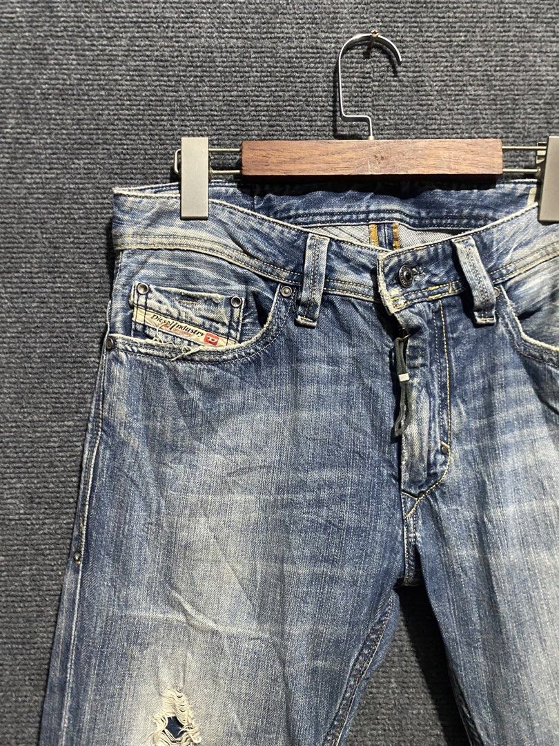 Diesel Jeans with Distressed Details (Category: Jeans) located in Bolinao. Submitted by frenced28 (Listing ID 1436787284, Image 2). Description: - Authentic Diesel jeans - Classic blue wash - Distressed detailing on front - Button fly - Small pocket with Diesel logo - Embroidered design on back pockets - Leather Diesel logo patch on back waistband.