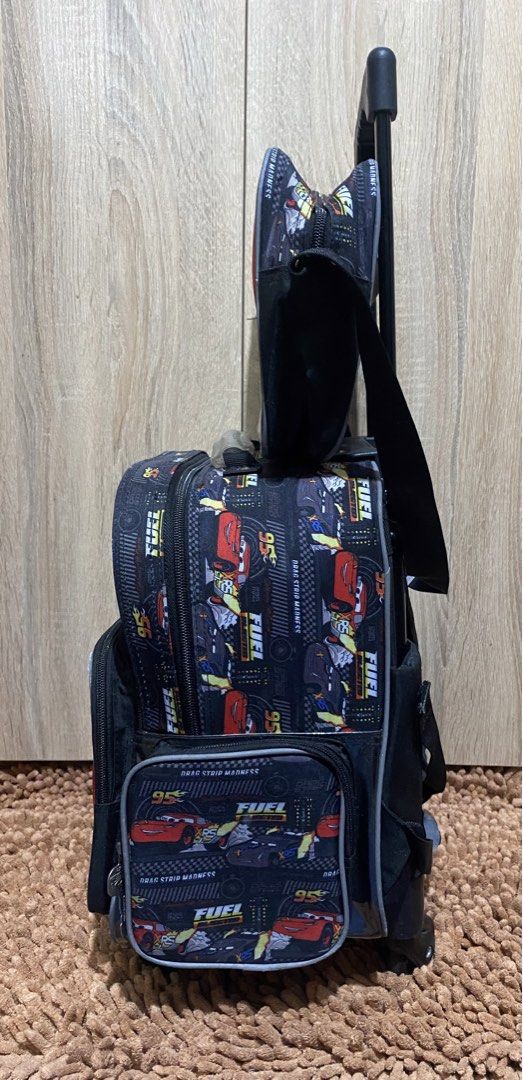 Disney Cars Lightning McQueen Bag (Category: Babies & Kids Fashion) located in Mandaluyong City. Submitted by aiztyle (Listing ID 1436685085, Image 2). Description: Disney Cars Lightning McQueen 4 wheels trolley backpack set Used but not abuse Kindly refer to the pictures posted For your proper reference. Measurement: L 13 W 12 (front) 8” (side) Original Price Php2,900 +++ SALE Php1000 only.