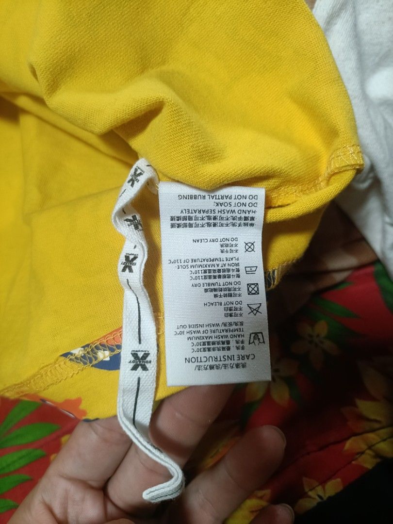 Ed Hardy Tiger Print T-shirt (Category: Tshirts & Polo Shirts ) located in Manila. Submitted by benhurgene30405 (Listing ID 1436741530, Image 3). Description: - Yellow Ed Hardy T-shirt - Features a tiger print design - Navy blue pocket and trim no issue cut hard tag (complete wash tags) - Short sleeves and round neckline.