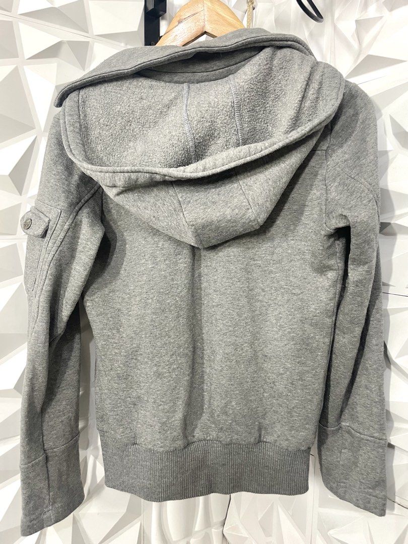 Gray Hooded Jacket for women Med-Large (Category: Coats, Jackets and Outerwear) located in Manila. Submitted by portiahermes (Listing ID 1436743758, Image 2). Description: 📍Great condition apart from one missing snap at the base Gray hooded jacket from Miss London. Features a double-breasted design with multiple buttons and pockets. Includes a hood with a drawstring. The jacket has a ribbed hem and cuffs. The brand label is visible inside the co