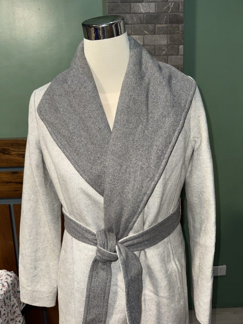 Gray winter coat (Category: Coats, Jackets and Outerwear) located in Legazpi City. Submitted by dgfn_413 (Listing ID 1436770738, Image 1). Description: Gray wool long overcoat Heavy material (ideal for winter season) Can fit S-M.
