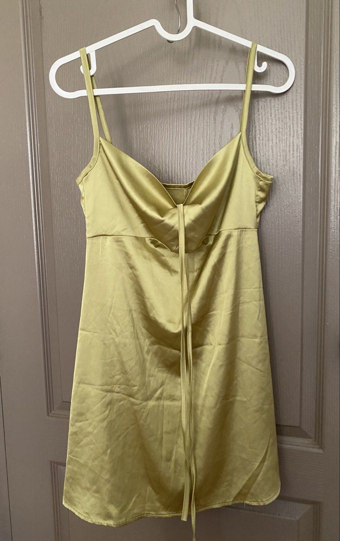 Green Satin Cami Dress Front Knot (Category: Dresses) located in Pasig City. Submitted by egfr26 (Listing ID 1436748142, Image 2). Description: With small holes( see pics) Fits Small- Medium Preloved ✨ 📍Pasig 🚚 SF shouldered by buyer. Within Metro only via Angkas/ Lalamove/ Grab 🎨 Color may vary due to lighting/screen settings 🧺 Please manage expectations. Actual condition shown in photos ❌ No return & exchange 💬 DM for inquiries.