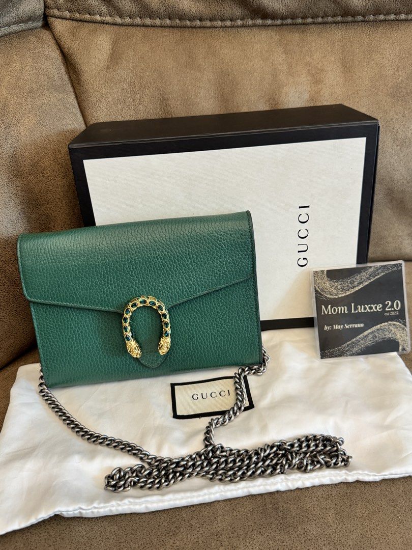 Gucci Dionysus Chain Wallet Green (Category: Luxury Bags & Wallets) located in Manila. Submitted by mayserrano16 (Listing ID 1436664833, Image 1). Description: - Authentic Gucci Dionysus chain wallet - Stunning green color - Signature tiger head closure with green crystals - Includes original box, dust bag, and authenticity card - Silver-toned chain strap - Ideal for everyday use or special events.