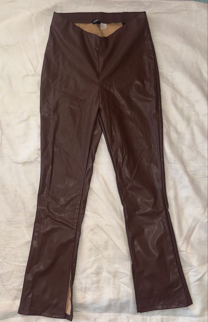 H&M Brown Faux Leather Pants (Category: Other Bottoms) located in Cebu City. Submitted by howhowthecarabao (Listing ID 1436718649, Image 1). Description: - Rich brown color - High-waisted design - Measurements: Length: 102 cm Rise: 24 cm Inseam: 73 cm - Slight flare at the bottom - Split hem detail - Fitted silhoutte - Not used .