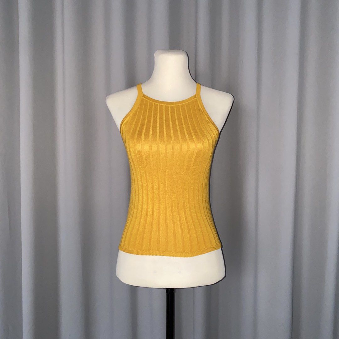 h&m ribbed sleeveless top (Category: Sleeveless) located in Muntinlupa City. Submitted by declutterwithkk (Listing ID 1436801612, Image 1). Description: - h&m mustard yellow sleeveless top - ribbed material - stretchable fabric.