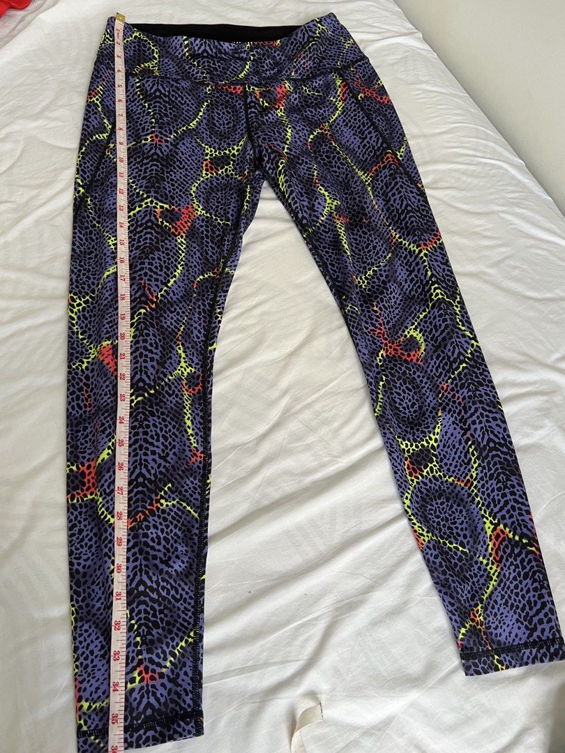 H&M Sport Leggings (Category: Activewear) located in Marikina City. Submitted by helpmedeclutter.ml (Listing ID 1436822699, Image 2). Description: - H&M Sport leggings - Eye-catching snakeskin print - High-waisted design - Convenient small pocket - Length: 36 inches - Waist (across): 13 inches - Colors: Purple, black, yellow, and red.