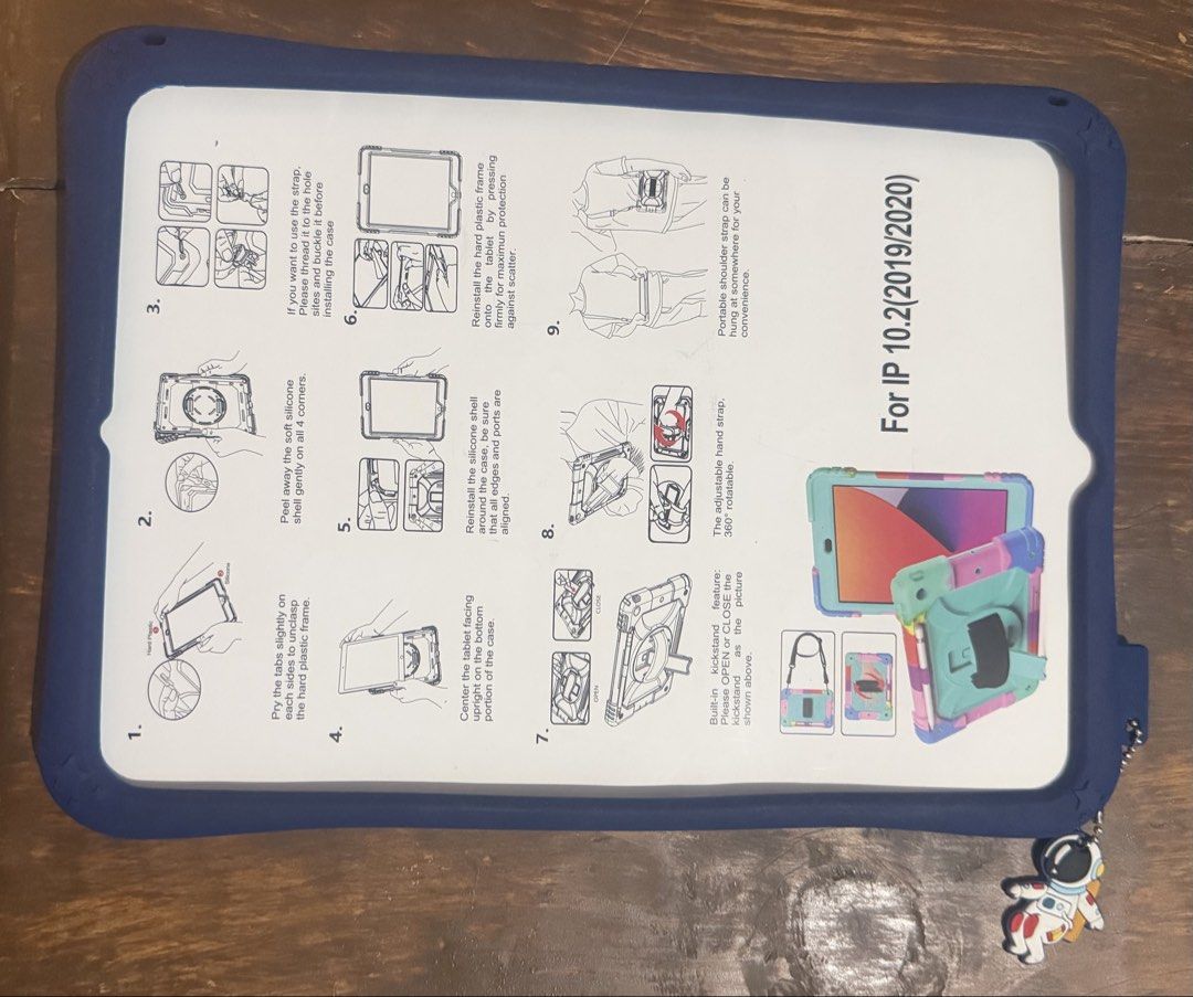 iPad 10.2 (2019/2020) Case - Space Design (Category: Cases & Sleeves) located in Manila. Submitted by nawtyness (Listing ID 1436694857, Image 2). Description: - Compatible with iPad 10.2 (2019/2020) models. - Fun space-themed design with astronaut, planets, and rocket. - Built-in stand for easy viewing. - 360-degree rotating hand strap for secure grip. - Includes a carrying strap. - Made of soft silicone material. Never used. Unsealed only. .